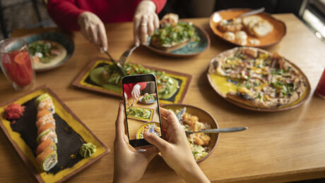 close-up-hands-taking-food-photos